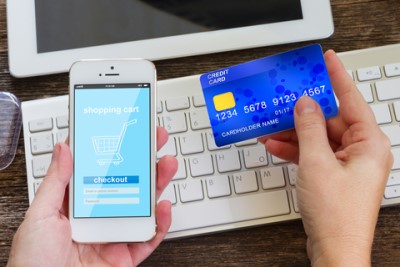 eCommerce with computer, phone and credit card